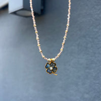 Lucky Zircons Pêche & Labradorite