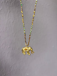 Collier Éléphant Doré Grenat et Turquoise